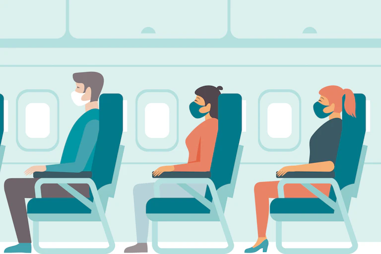 Rows of people on plane wearing masks