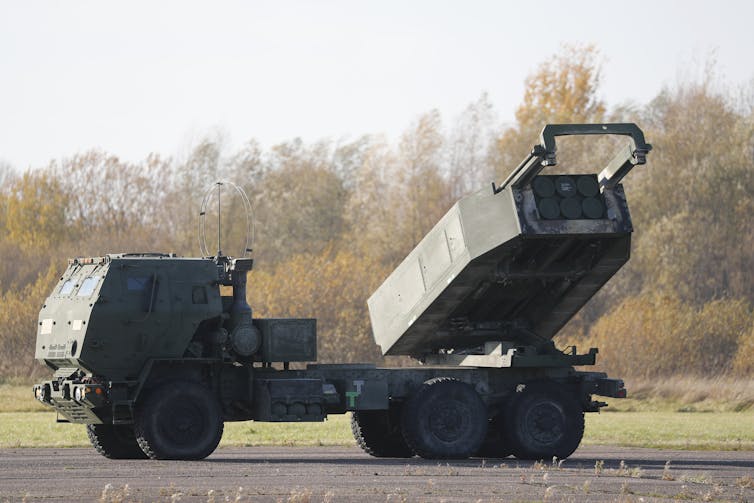 A view of a US High Mobility Artillery Rocket System (HIMARS) during a landing exercise at Spilva airfield in Riga, Latvia, 25 October 2021.