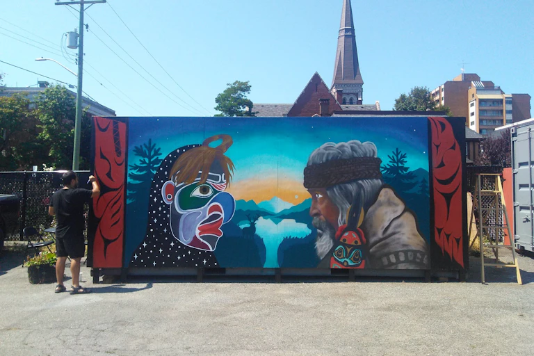 A many paints a mural