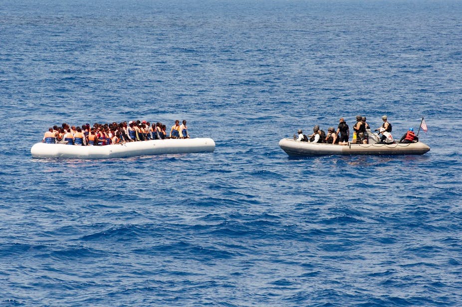 two boats filled with people on a water body