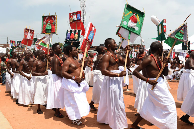 Okaiben family performs Ekassa dance during the coronation ceremony of the newly crowned 40th Monarch of the Benin kingdom Oba Ewuare II in Benin City, midwest Nigeria, on October 20, 2016