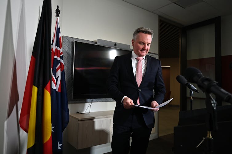 Chris Bowen at a press conference