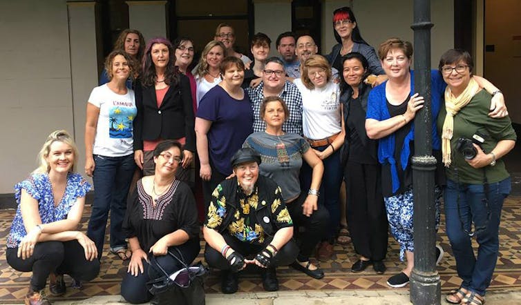 A group of people smiling at the end of an event where they drafted the Darlington Statement, an intersex community declaration for Australia and Aotearoa New Zealand.
