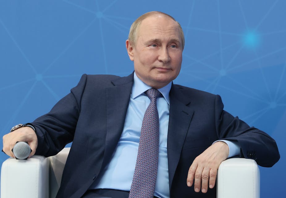 Vladimir looking comfortable in an armchair
