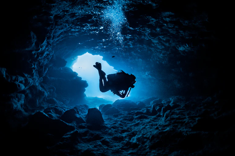 A diver in a cave