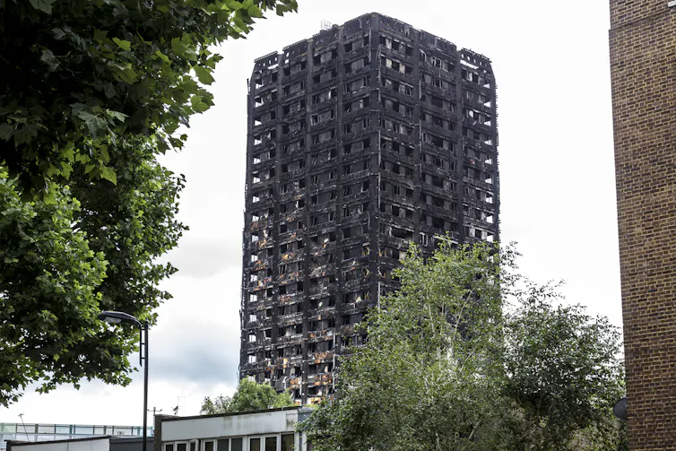 A shot of a high-rise building that has been burned.