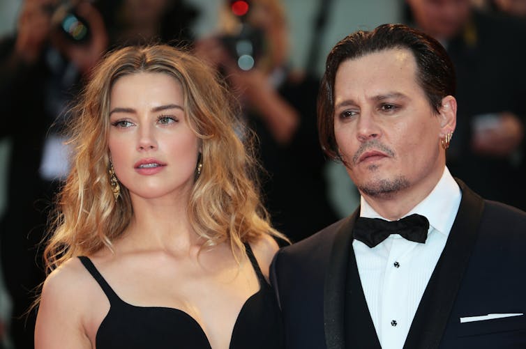 Red carpet photo of Amber Heard and Johnny Depp from 2015.