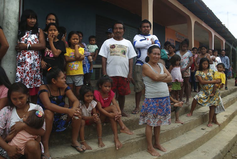 indigenous people on steps