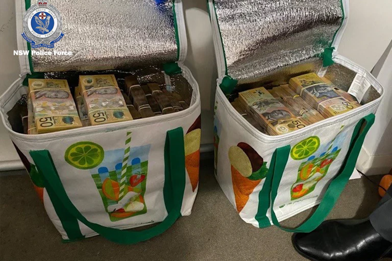 An undated handout photo made available by the NSW Police shows cash seized as part of Operation Ironside, issued 08 June 2021.