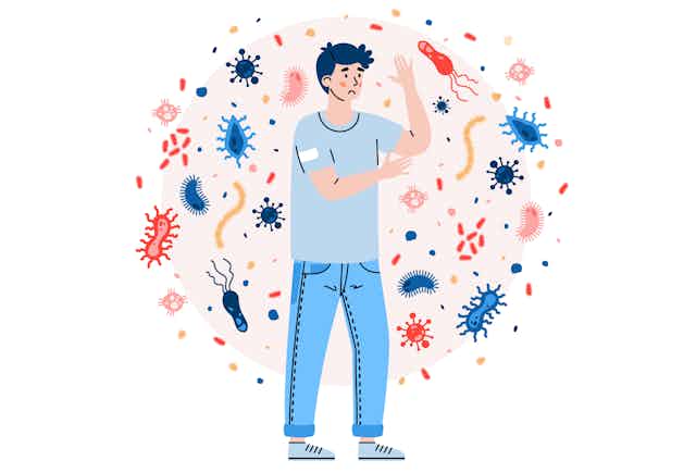 Illustration of person surrounded by various pathogens