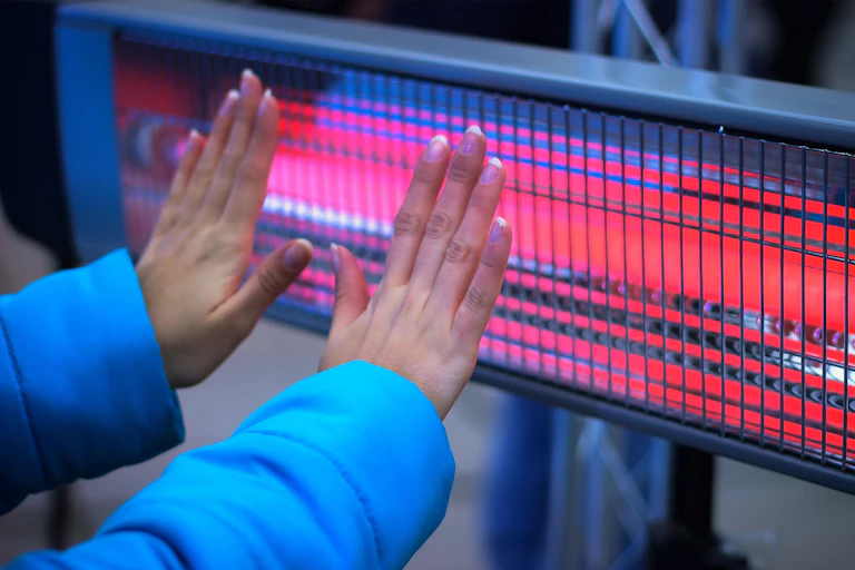 warming in front of heater