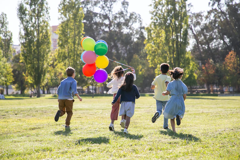 Kids running in a park