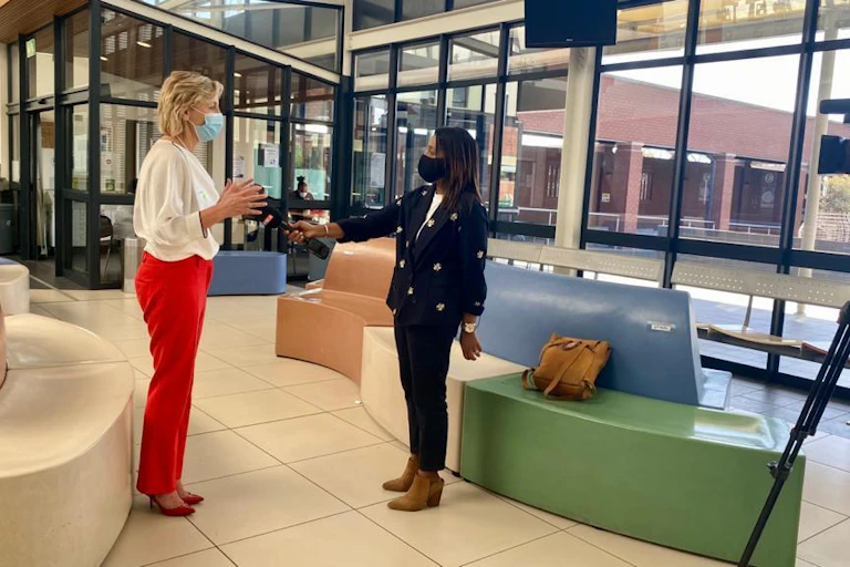 Women interviewing another one.