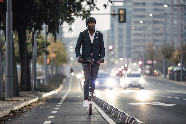 Businessman on cycle path