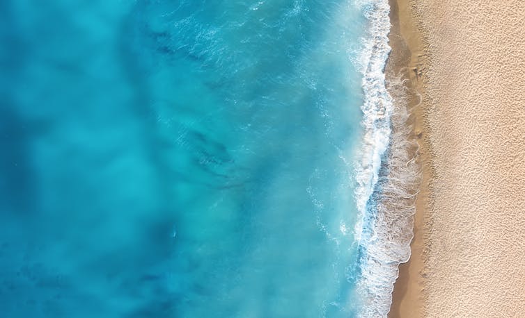 Waves and beach from above