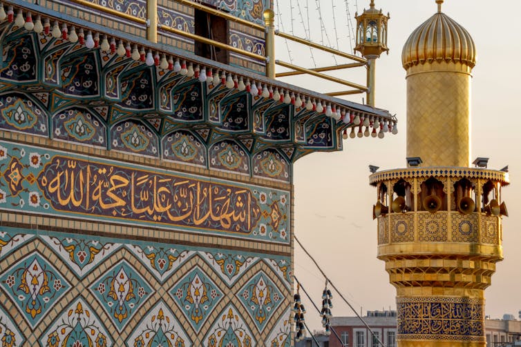 A close up shot of the mosaiqued wall of an Iraqi mosque.