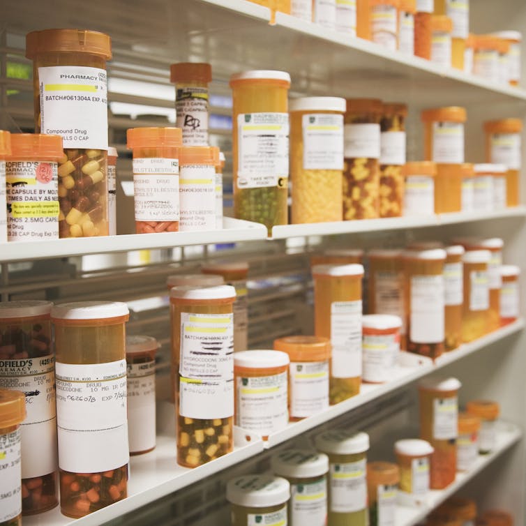 Shelves of orange pill bottles