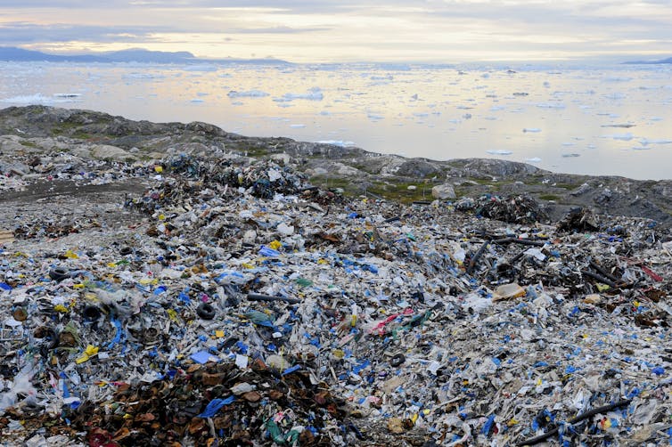 A massive dump with the Arctic ocean in the background.