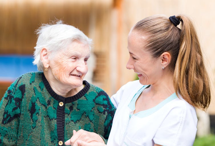 older woman with female caregiver