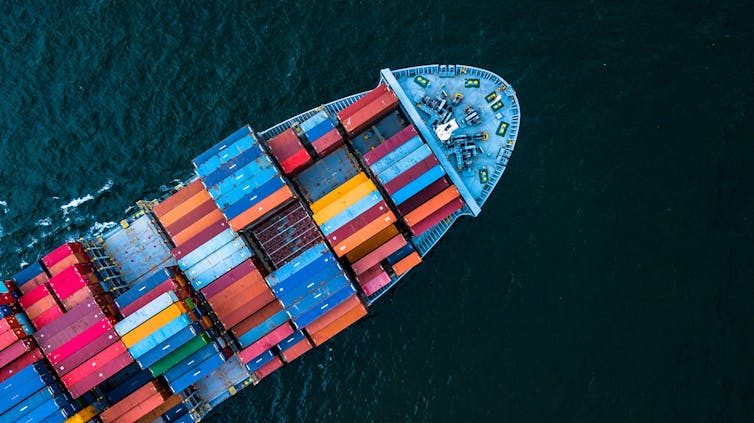 aerial view of container ship on ocean