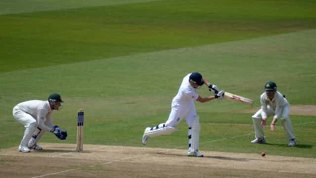 England batsman Jonny Bairstow plays a shot during the 3rd day of the 1st Test of the 2013 England v Australia Ashes series at Trent Bridge, Nottingham. Brad Haddin is keeping wicket.
