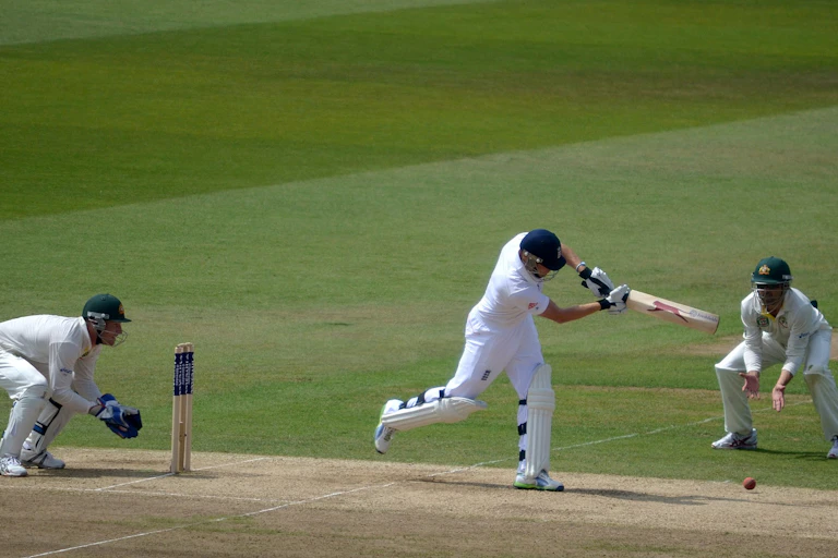 England batsman Jonny Bairstow plays a shot during the 3rd day of the 1st Test of the 2013 England v Australia Ashes series at Trent Bridge, Nottingham. Brad Haddin is keeping wicket.