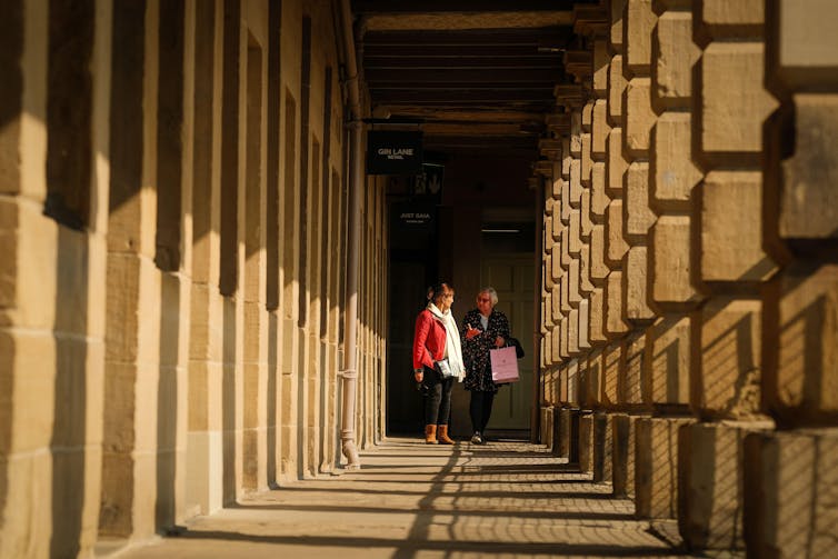Two shoppers at the Piece Hall in Halifax