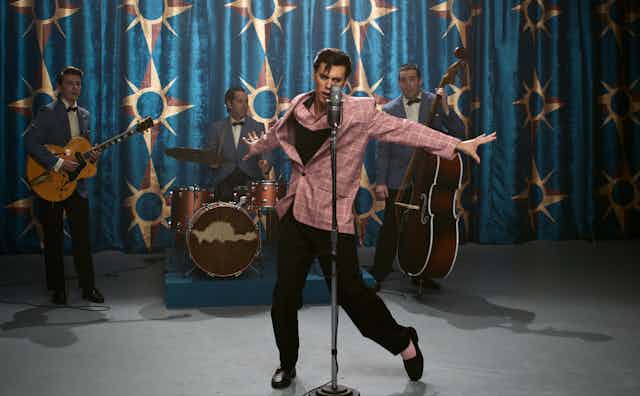 Film still: Elvis on stage