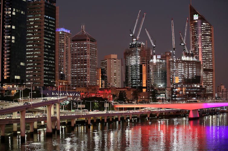 city skyline lit up at night