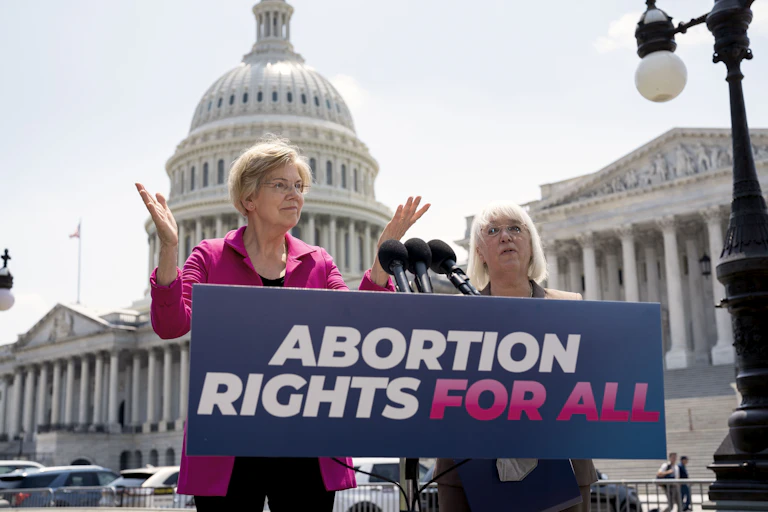 Two senators outside the US Supreme Court