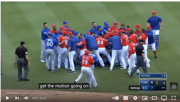 Sportsmen warm up in a stadium