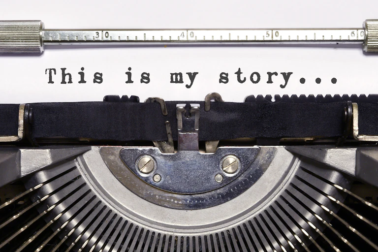 close-up of the typewriter mechanism with a line of text on paper