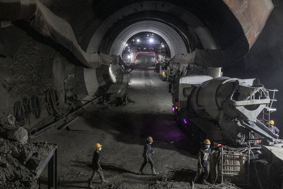 Construction workers work on the tunnel for  the Jakarta-Bandung High-Speed Train (KCJB). 