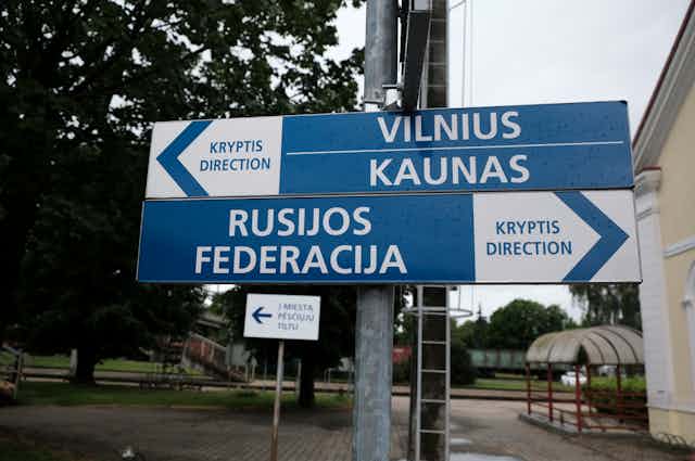 Direction signs at the border railway station Kybartai, between Kaliningrad and Lithuania in Kybartai, Lithuania, 21 June 2022.