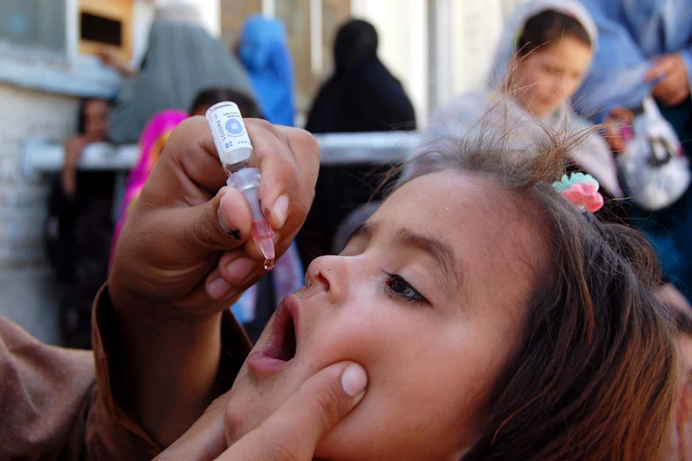 Child receiving the polio vaccine.