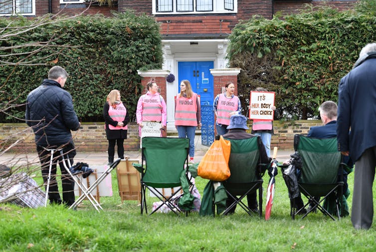 Protesters in front of an abortion clinic.