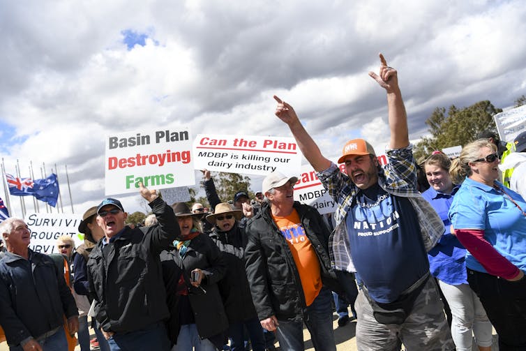 farmers protest with signs