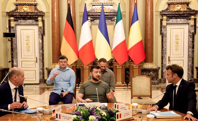 German Chancellor Olaf Scholz, Ukrainian President Volodymyr Zelensky and French President Emmanuel Macron meet for a working session in Mariinsky Palace, in Kyiv, June 16 2022