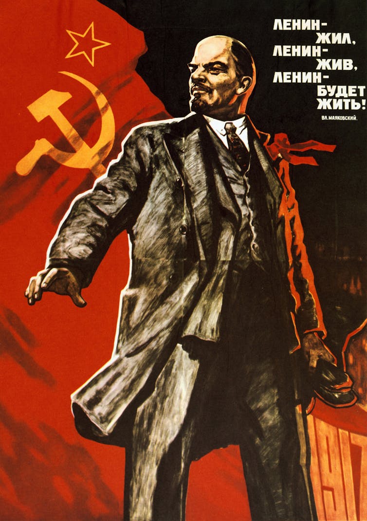 A colored photograph shows Lenin behind a Soviet symbol, with Russian text