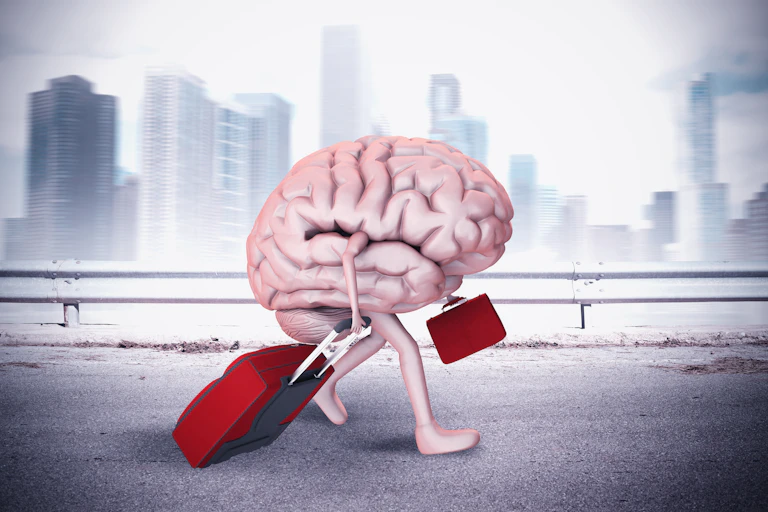 Dessin représentant un cerveau doté d'une valise