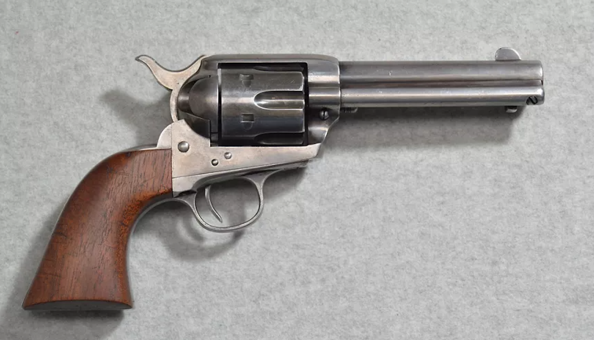A revolver with a wooden butt