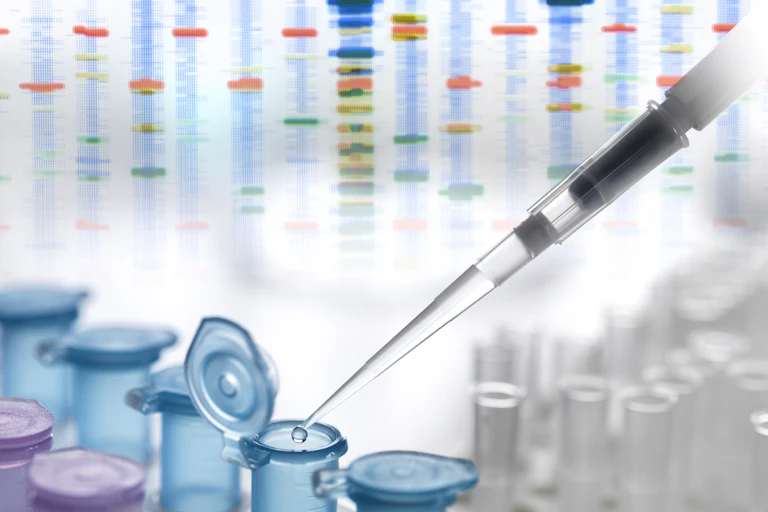 A DNA sample being pipetted into a eppendorf tube for automated analysis