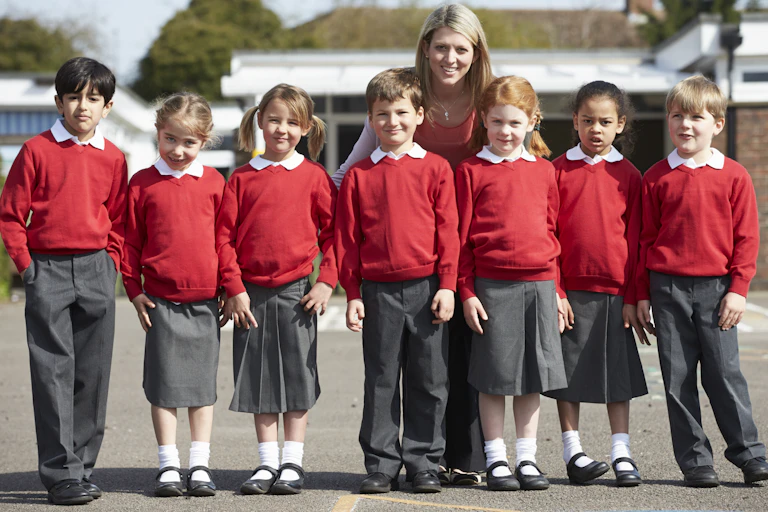 Teacher with primary school students