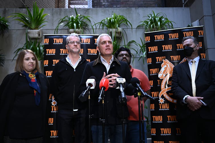 Nsw Transport Workers Union Secretary Michael Kaine, Along With Uber Drivers And Nsw Senator Tony Sheldon (A Former Twu Secretary), Talk About The Agreement With Uber At A Press Conference On June 29, 2022.