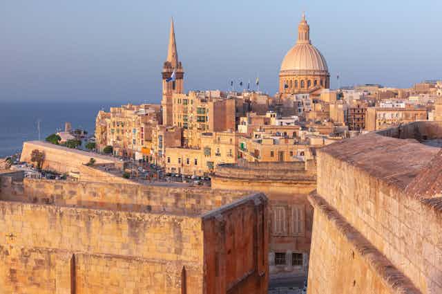 A view of the old town by the sea in Valletta, Malta.