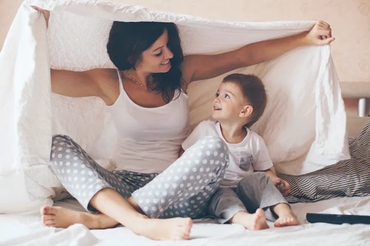 Mother and son playing