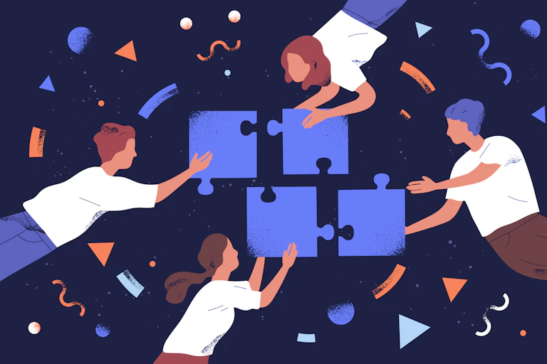 Jeunes associant les pièces d'un puzzle