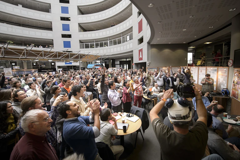 Image from press conference for the announcement of the Higgs boson discovery.
