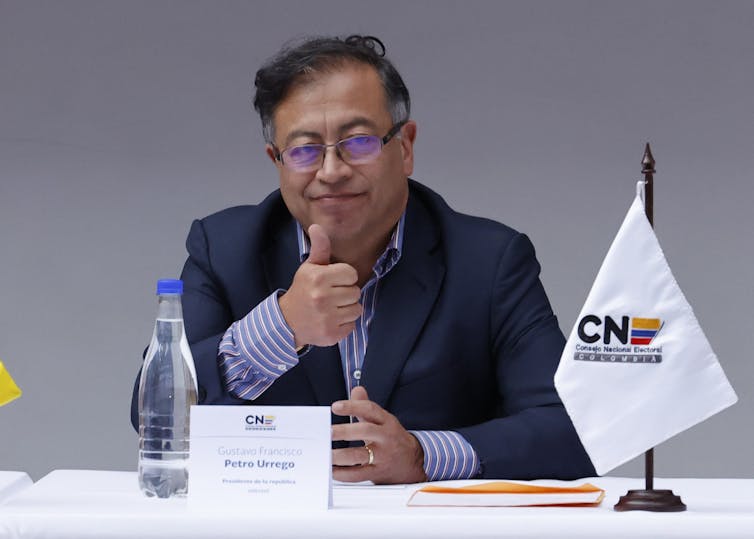 Gustavo Petro gives a thumbs up to supporters after being ratified as president-elect of Colombia, June 2022.