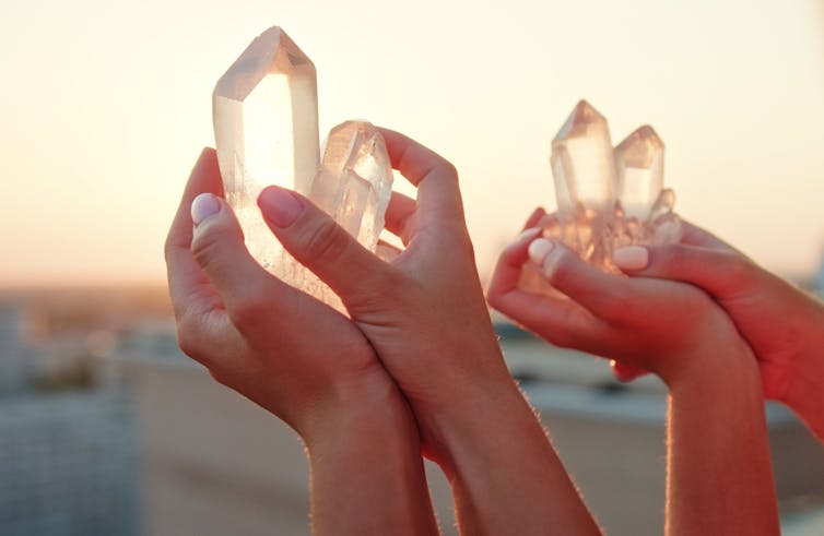 hand holding crystal